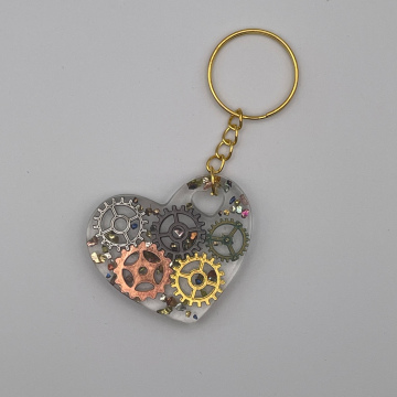 Porte-clef cœur engrenages et pierres de verre
