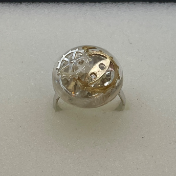 Bague ronde engrenages argent et dorés